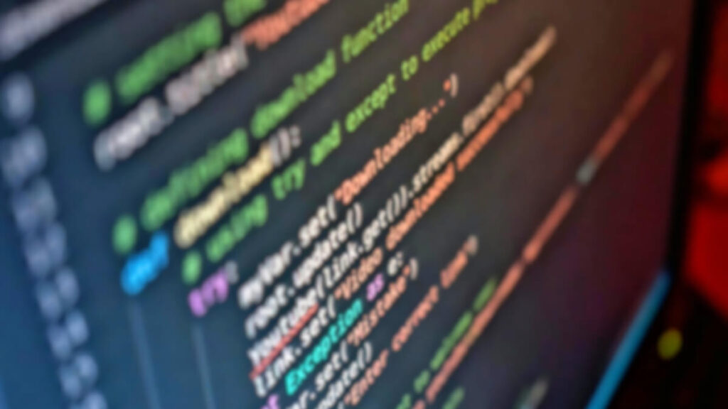 画面にhtmlなどのソースコードがアップで表示されている画像